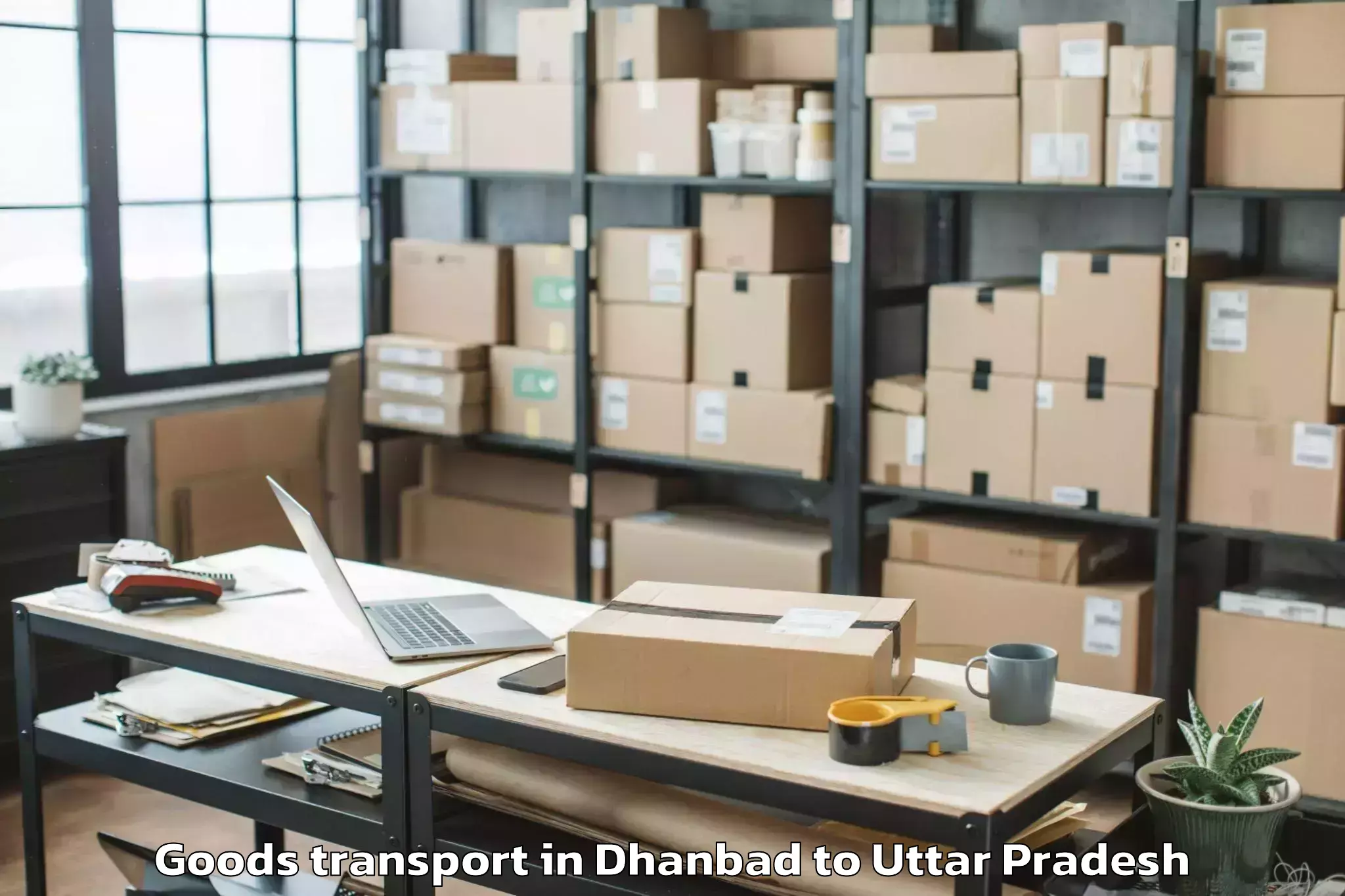 Easy Dhanbad to Maniar Goods Transport Booking